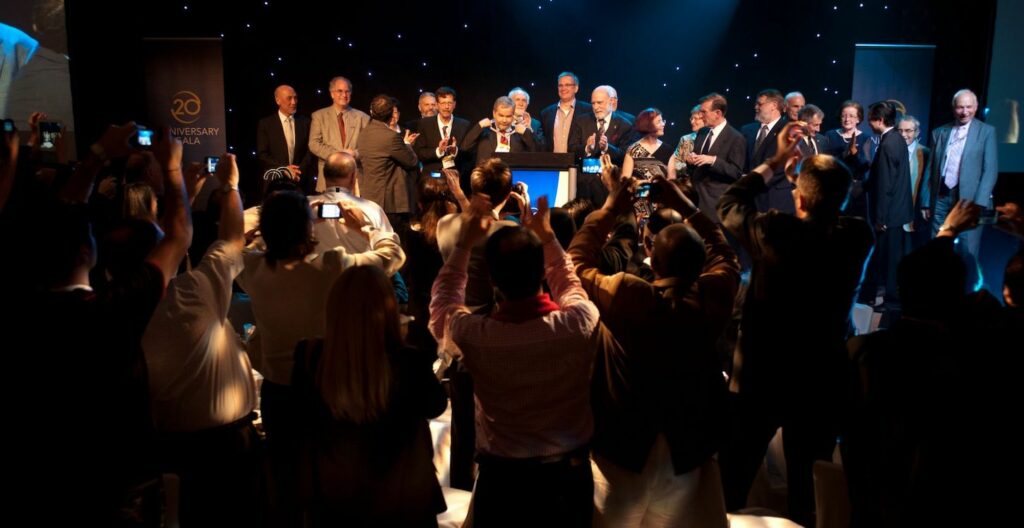 people on stage receiving awards